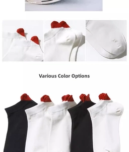 Detail view of cotton socks with red heart embroidery and ribbed non-slip cuffs