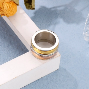 Classic tri-color band ring with sparkling cubic zirconia in gold rose gold and silver