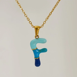 Blue gradient enamel letter F pendant necklace on a gold chain for women