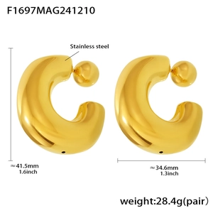Polished C-shape thick gold earrings with steel balls measuring 41.5mm high and 34.6mm wide