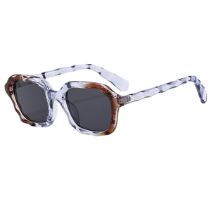 Retro small square frame sunglasses with wavy blue tortoiseshell design and gray lenses