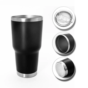 Detail view of 30oz black stainless steel tumbler with transparent lid and silver rim