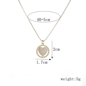 Minimalist 18k gold heart necklace for women featuring pavé zircon stones and bead design