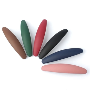 Set of 6 matte colorful hair clips including brown, green, and red in fan arrangement