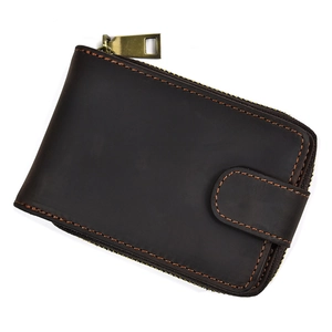 Detailed view of dark brown crazy horse leather coin purse with orange contrast stitching