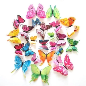 Macro shot of 20 colorful 3D butterfly wall stickers in various sizes on white background