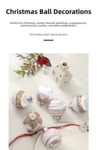 Macro detail of white woven Christmas balls with gold glitter and elegant festive patterns