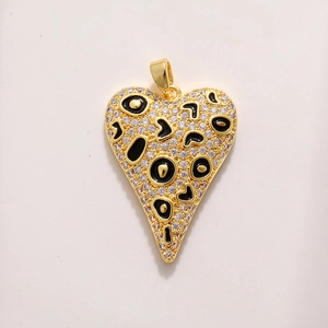 Macro shot of gold-plated leopard print heart pendant with pavé cubic zirconia accents