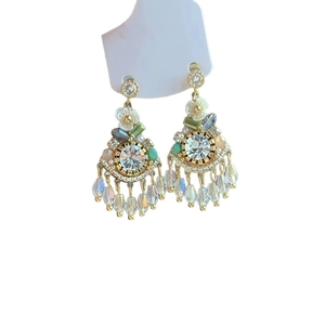 Floral crystal tassel earrings with green gems and golden fringe in vintage style