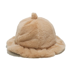 Detail view of khaki faux fur bucket hat with pom-pom and ruffled brim edges