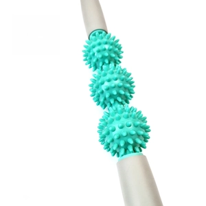 Close-up of a three-ball muscle massage roller with green spiked fascia therapy nodes