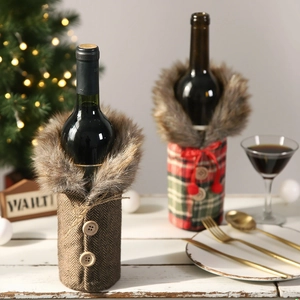 Detail of Christmas wine bottle covers with faux fur collars in plaid and herringbone