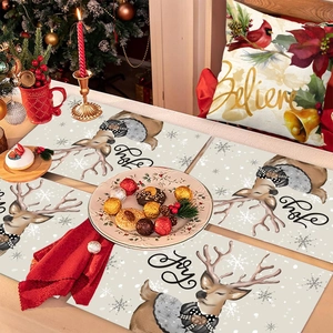 Christmas reindeer table placemats set with festive Joy pattern and Believe pillow cover