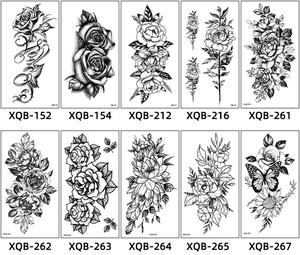 Selection of black and white floral temporary tattoos featuring roses and butterflies
