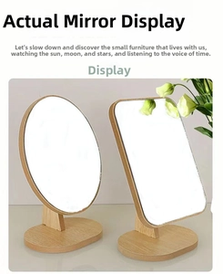 Detail of square and oval wooden desktop makeup mirrors with light natural finish bases
