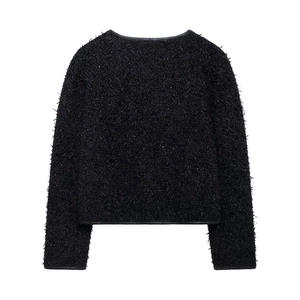 Vue arrière à plat d'une veste en tweed noire à col rond avec texture tissée détaillée