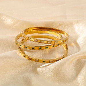 Three-piece 18K gold plated titanium steel bangle set with colorful square zircons on silk