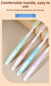 Set of four ergonomic soft-bristled manual toothbrushes in assorted pastel colors
