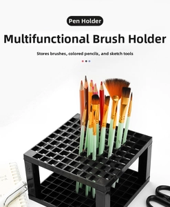Detail view of a black 96-slot plastic brush holder for watercolor and oil brushes