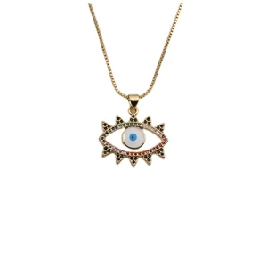 Fashionable gold evil eye necklace with colorful zircon stones on a clean white background