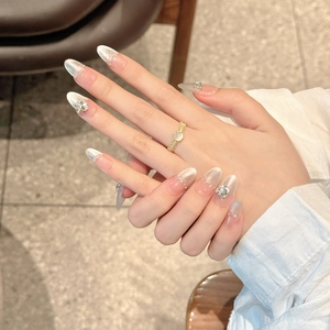 Sparkling long almond press-on nails with ice-permeable gradient and K9 rhinestones