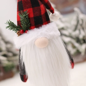 Nordic Christmas gnome wine bottle cover with red plaid hat and festive greenery