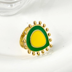 Unique gold metal open ring with green avocado eye design and yellow enamel center
