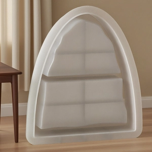 Macro detail of white arched resin silicone mold with double-layered storage tray design