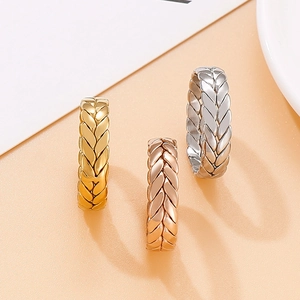 Three-color woven texture rings in gold, rose gold, and silver finishes for a trendy look