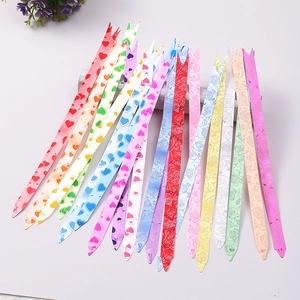 Colorful festive pull bows with heart and star patterns for gift wrapping and decoration
