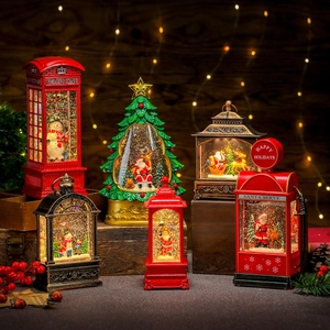 Lighted musical Christmas snow globe lanterns with rotating glitter and holiday figurines