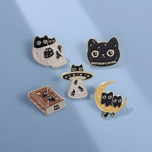 Set of 5 creative cartoon enamel pins featuring black cat, moon, book, and UFO motifs