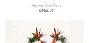 Detail of Christmas reindeer antler hair clips with plush balls and festive berry decor
