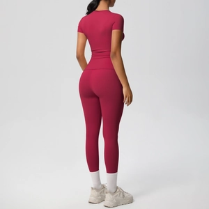 Rear view of a dark red two-piece yoga set showing slim fit top and high waist leggings