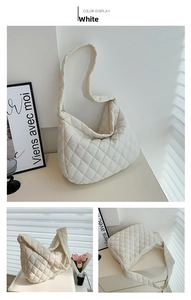 Detailed views of a white quilted oversized cloud shoulder bag in soft leather finish