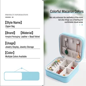 Cross-pattern PU leather travel jewelry box with zipper and multi-functional storage slots