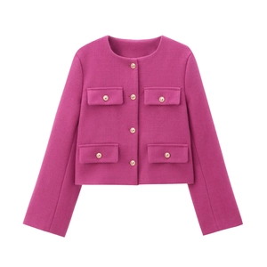 Detail of fuchsia tweed jacket featuring golden buttons and four flap pocket design
