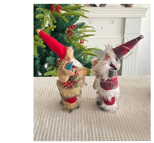 Close-up of 9-inch standing Santa Claus and red-hat elf plush dolls for Christmas decor