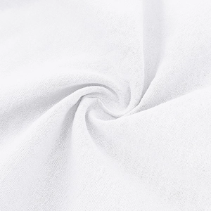 Close-up of white cotton-linen fabric showing fine twill texture and soft material quality