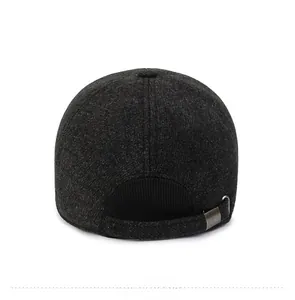 Rear view of dark grey wool baseball cap showing adjustable metal buckle and thick knit texture