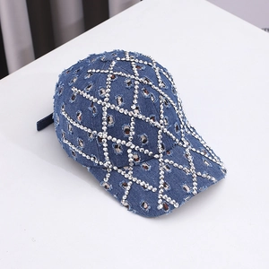 Distressed dark blue denim baseball cap with rhinestone grid pattern and frayed details