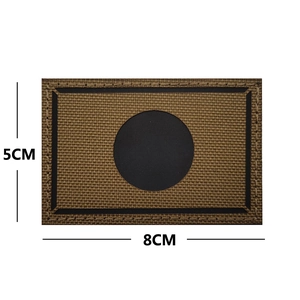 Detail of 8x5cm tactical IR patch in tan canvas with laser-cut circular infrared design