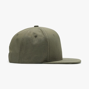 Olive green flat brim snapback hat featuring an intricate paisley pattern on canvas material