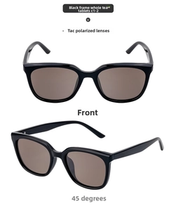Close-up of black oversized sunglasses with TAC polarized lenses and tea brown tint
