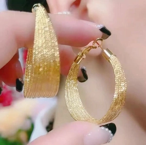 Exaggerated gold mesh texture hoop earrings with multi-layer geometric horseshoe design