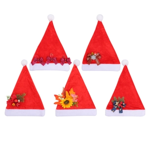 Set of five plush red Christmas hats with assorted festive bows and floral decorations