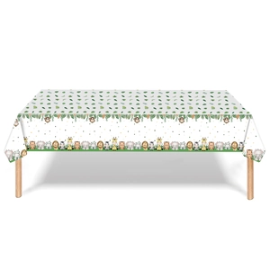 Close-up of jungle animal table cover with lions, giraffes, and zebras for party decor