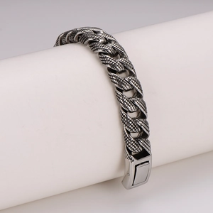Men's retro punk stainless steel bracelet with dragon scale texture on white pillar