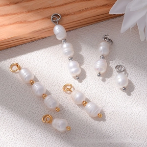 Detailed view of baroque freshwater pearls in gold and silver hardware settings