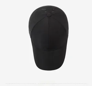 Top view of black quick-dry baseball cap showing breathable laser-cut laser mesh vents